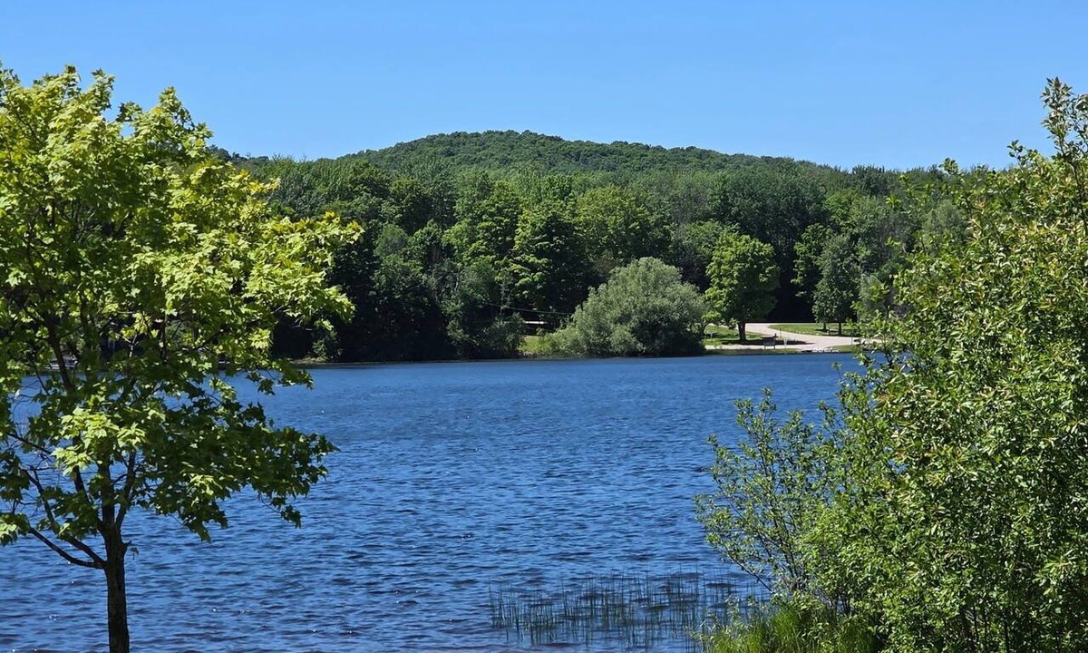 East Jordan Cottage | 45th Parallel - Where Life Is in Balance "Spacious Lakefront Cottage"