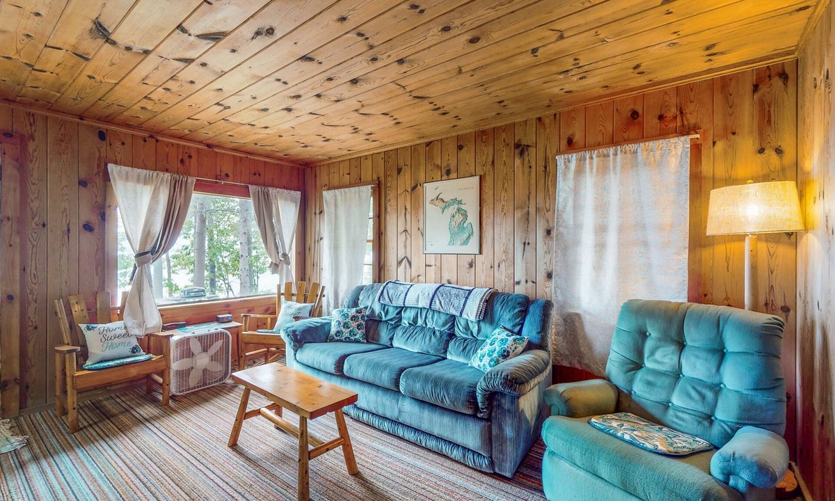Indian River Cottage | Charming lakefront cottage with large yard, dock, & fire pit - close to downtown