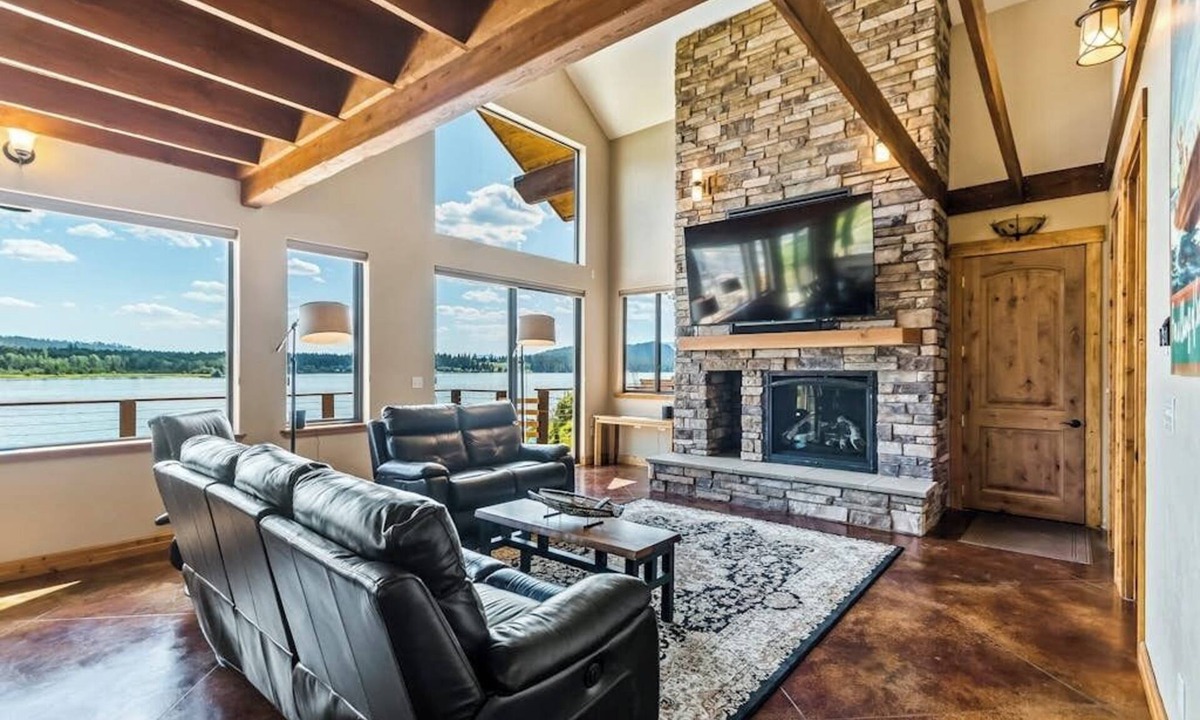Laclede House | Custom riverfront home with private dock, game room, hot tub & heated floors