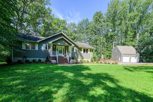 Livingston House | Lakefront home with deck, hot tub, game room, kayaks, & fireplace