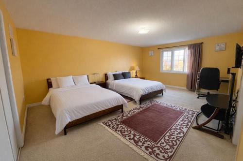 Brampton House | Spacious 2-Bed Suite with Private Bath, Mini Fridge, TV & Walk-In Closet in Brampton Shared Home - 4 Baths, Full Kitchen, WiFi, Laundry & Deck - Near GO Station, Great for Groups!