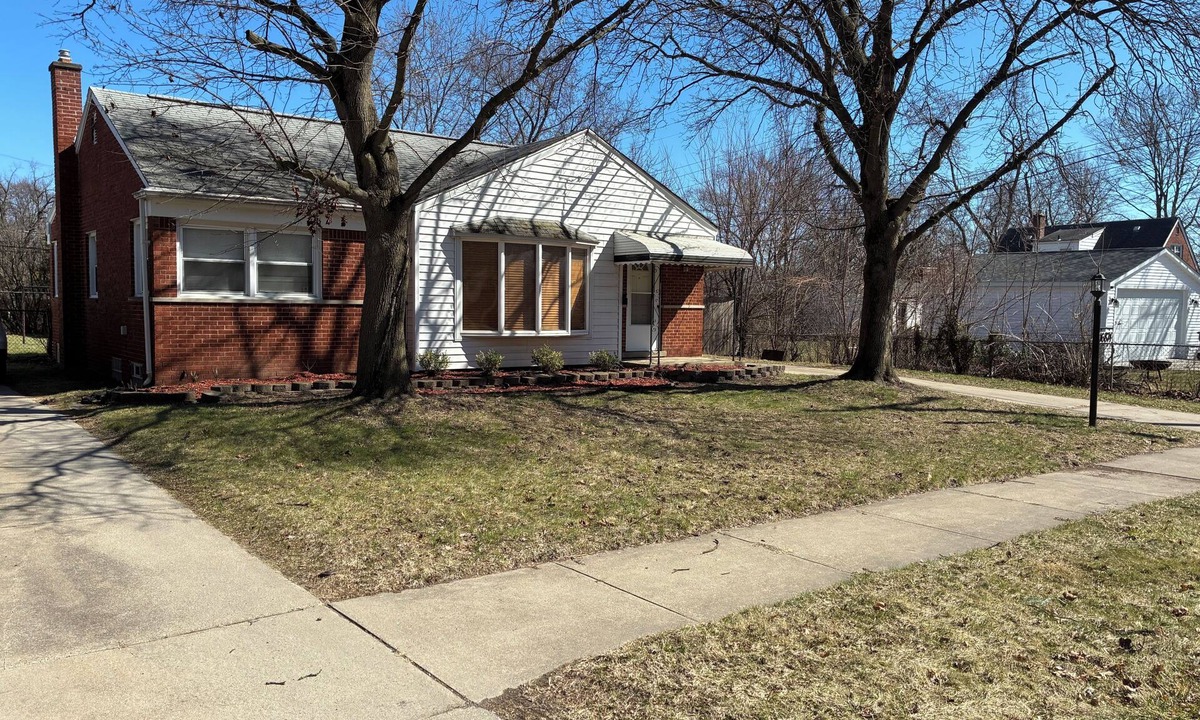 Redford House | Updated brick ranch with lots of space.