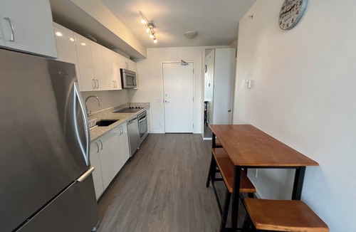 East Village Condo | Calgary downtown modern condo 2 bed 2bath next to library, no smoke no pet