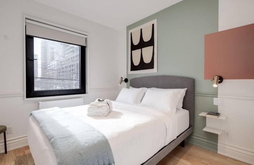 Beaconsfield Village Apartment | Chic Oasis above a resto on trendy Queen West