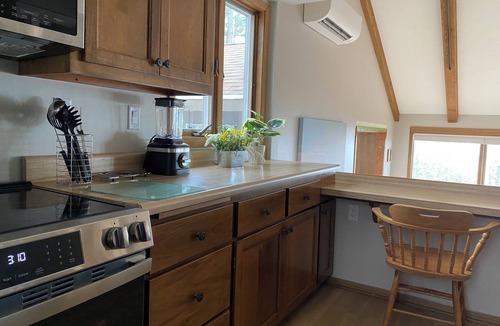 Sturgeon Bay House | Cliffside Egg Harbor Retreat With Sweeping Bay Views on 5 Wooded Acres