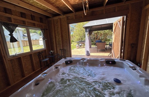 Summerside House | Cozy Summerside Retreat | Hot Tub + Fireplaces