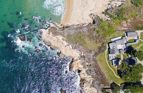 Montara House | Distinguished Oceanfront Point Estate with Iconic Beach Mountain Vistas