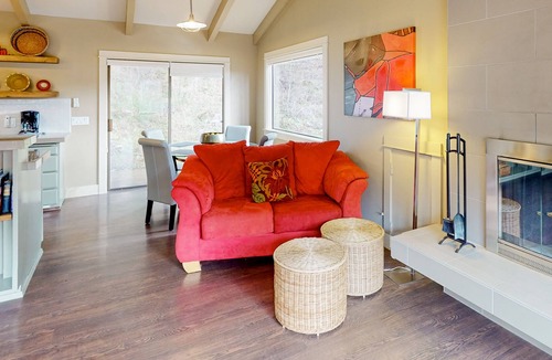 Orcas House | Dog-friendly forest cottage with a scenic deck, grill, fireplace, & central AC