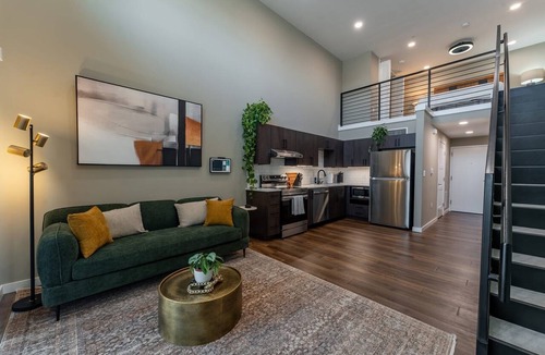 Springfield Apartment | Elevate Your Stay in Our Stunning Loft with 17-Foot Ceilings