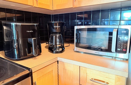Downtown Calgary Apartment | Exec Riverfront 1BR, steps from the river and vibrant downtown. pet-friendly