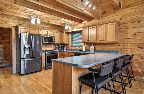 Leitchfield House | Expansive lakefront cabin with game room and yard!