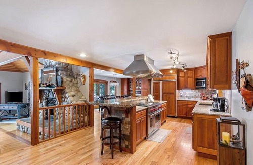 Clark Fork House | Expansive Riverfront Lodge with Dock, Game Room, Bar & Spacious Deck!