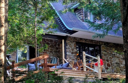 Brownsburg-Chatham Ski Chalet | Gorgeous authentic 4-bedroom lakefront chalet with spa.