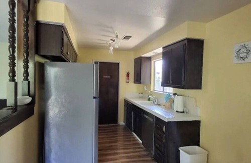 Redding House | Hillside home with large deck in a woodsy area. Sleeps 8