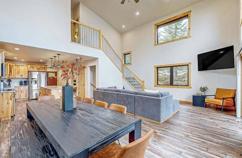 Eagle River House | Lakefront home with yard, private dock, deck, firepit, & washer/dryer