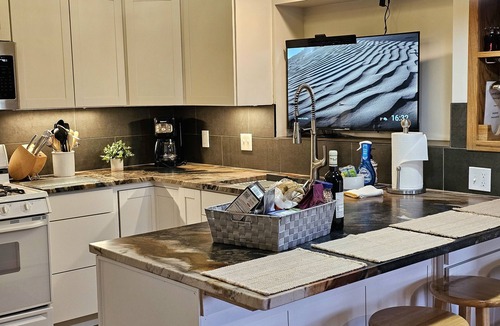 Four Corners House | Magnificent willow shade trees, waterfall, and sleeping comfort. Book this Home!