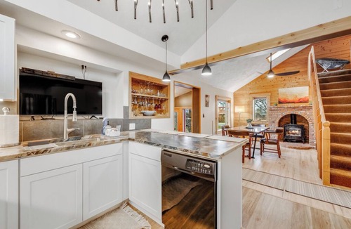 Four Corners House | Magnificent willow shade trees, waterfall, and sleeping comfort. Book this Home!