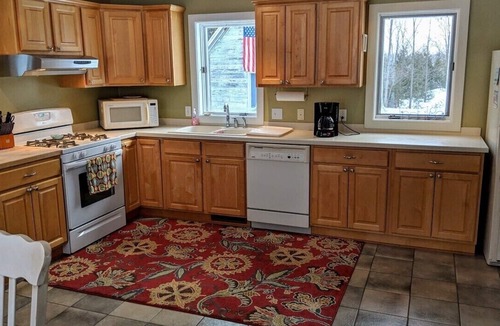 Fish Creek House | Modernized Classic Log Home Close to Shopping and Sunset Walks
