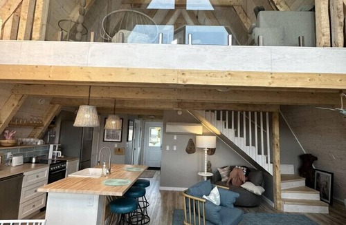 Aspy Bay House | Mystical Beachfront Chalet , Hot tub , Sauna and Heated Container Pool