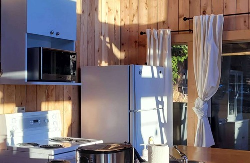 Sliammon Cabin | Ocean Views & Sunset Beach Cabin with soaker tub & fire pit
