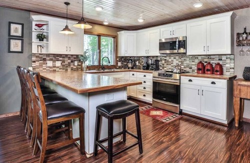 Boulder Junction House | Private waterfront home with dock, kayaks, firepit, & open layout - dog-friendly