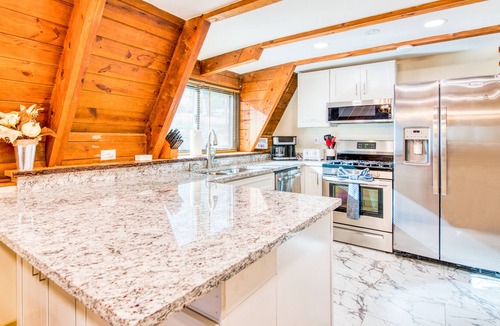 Bent Creek Ski Chalet | Recently updated rustic A-frame with hot tub, dazzling outdoor views, & firepit