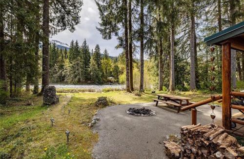 Verlot House | Riverfront cabin with hot tub and sauna 1st floor