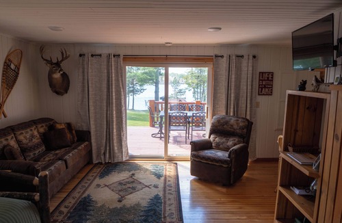 Solon Springs Cabin | Rustic Lake Front Log Cabin: Stunning Sunset Views, Private Dock & Fast WiFi