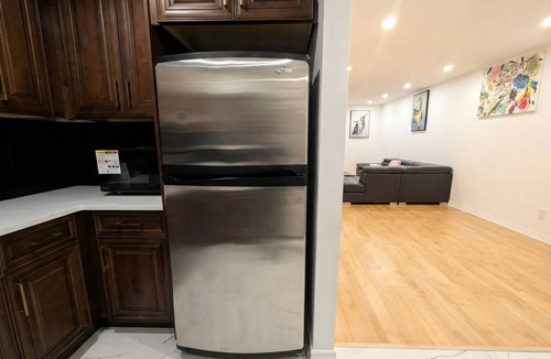 Laval House | Spacious 2BR | FREE Parking + 1.5 Bath | Near YUL
