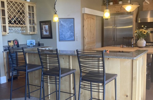 Big Sky Meadow Village Condo | Spacious Condo on Golf Course & Creek w/hot tub