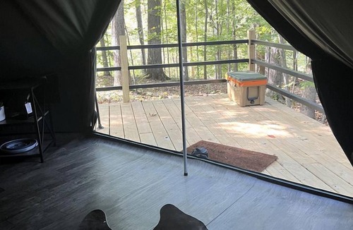 Joelton RV Rental | Spacious Equipped Bell Tent with Deck, Fire Pit and Picnic Space in Tennessee