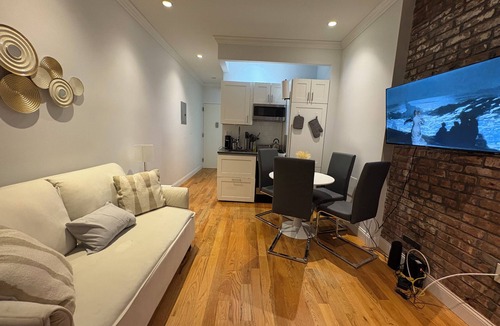 Central New York City Apartment | Stylish 2BR Midtown West Apartment w/Exposed Bric