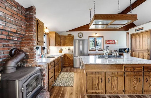 Bigfork House | Swan River Rendezvous - Riverfront Retreat w/Dock
