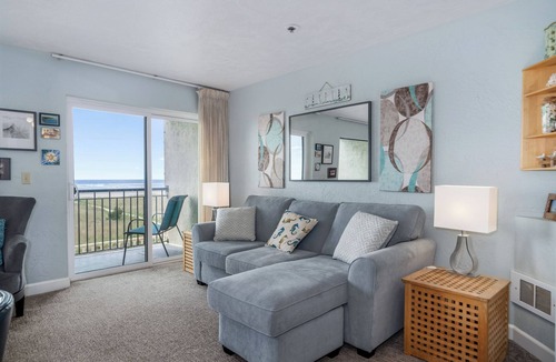 Seaside Condo | Sweeping oceanfront views from this one bedroom condo right on the prom!