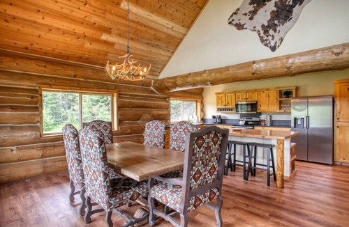 Bonner County Cabin | The Cabin · Rustic Log Cabin with Pasture and Mountain Views