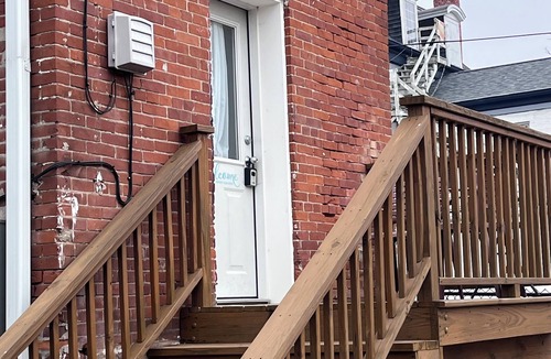 Dubuque Apartment | Tiny Home, Spa Next Door, Deck, Walk to Farmers Market