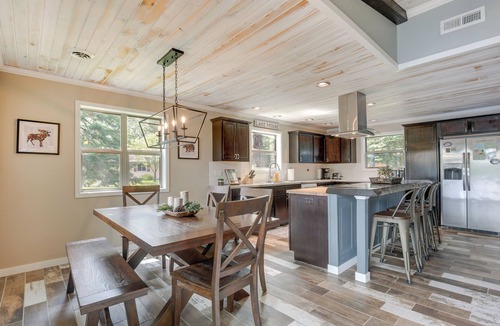 Tomahawk Cabin | Tranquil Lakefront Cabin: Fire Pit, Grill & Patio