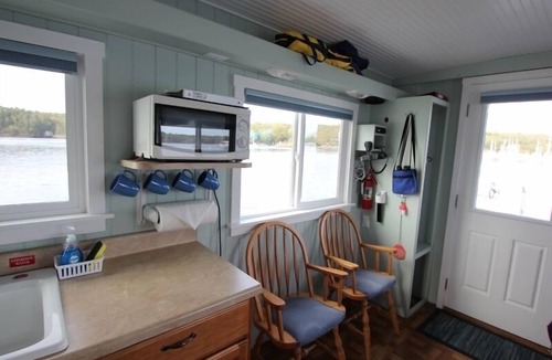 Mac Mahan Boat Rental | Unique, romantic, motorless floating island w/4 hp skiff