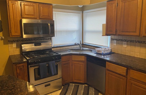Redford House | Updated brick ranch with lots of space.