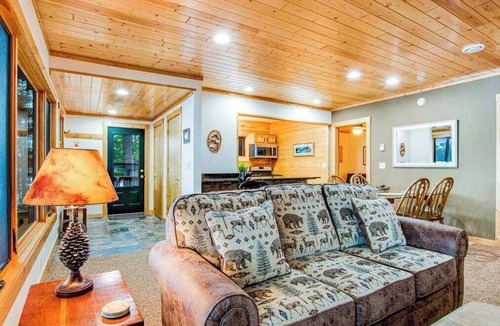 Sayner Condo | Waterfront cabin with Plum Lake views, private dock, beach access & kayaks