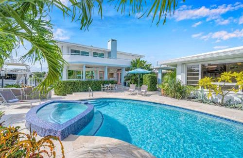 Coral Ridge Villa | Waterfront Compound 2 Heated Pools SaltAire Lime Keys