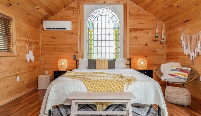 Boho room with King bed at New Park, a picturesque Finger Lakes event venue