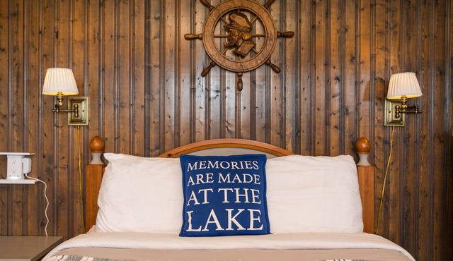 Captain’s Den is our executive blue toned all wooden room with a Captain’s flair