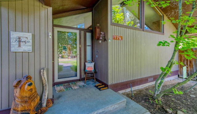 Peaceful Graeagle Meadows retreat with fenced yard and grassy backyard