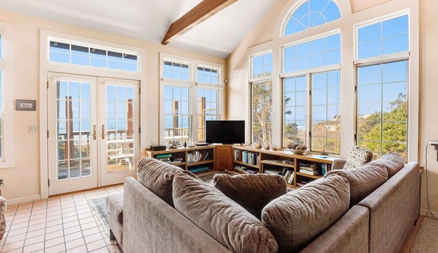 Secluded beachfront home with Pacific Ocean views, fireplace, game room, grill