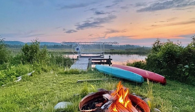 Tranquil Grass River Cottage Retreat